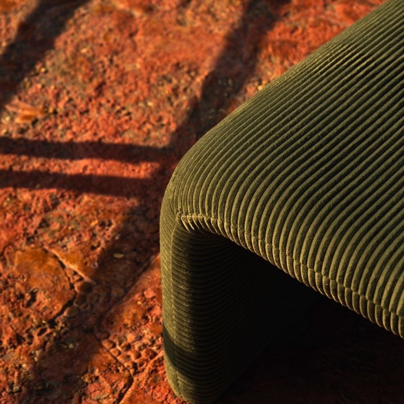 Olive green corduroy modular armchair with ribbed fabric texture on a terrace overlooking the sea Mahogni