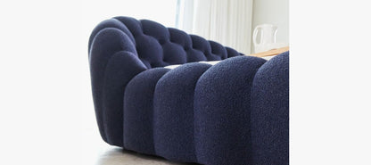 Close-up Details of Luna Bed Quilted Bouclé Headboard and Warm Pillows