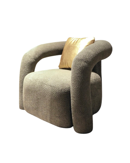 Modern aura sculptural accent chair in olive grey boucle fabric with gold satin pillow by Mahogni furniture.