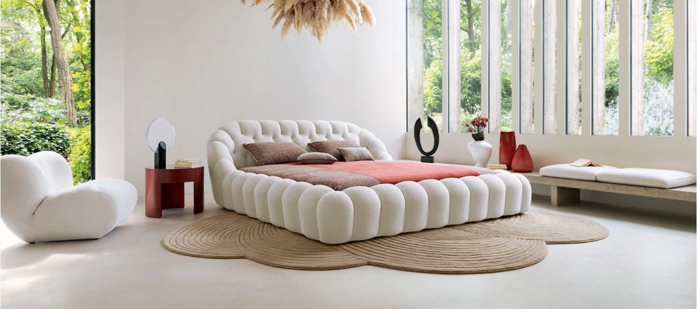 Contemporary Bedroom Interior with Bouclé Puffy Bed and Textured Decor