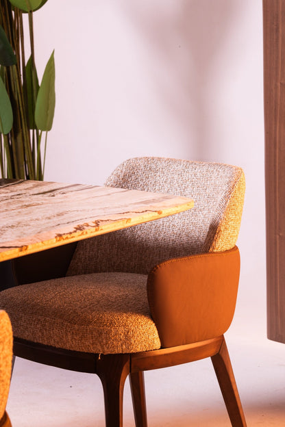 Modern Light Dining Room set with oval marble table, sculptural pedestal bases, and textured chairs by Mahogni.