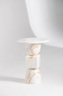 Vanta white marble side table with gold veining and stacked geometric shapes