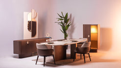 Modern Light Dining Room set with oval marble table, sculptural pedestal bases, and textured chairs by Mahogni.