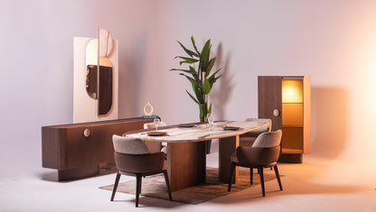 Modern Light Dining Room set with oval marble table, sculptural pedestal bases, and textured chairs by Mahogni.